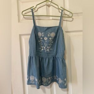 Medium blue floral design tank top.